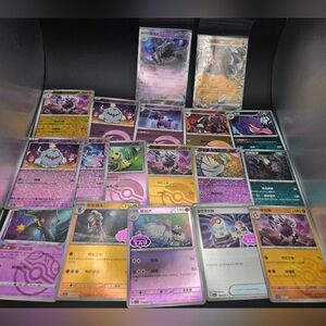 Vibrant Pokémon Card Collection with Purple and Yellow Accents